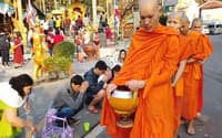 Budget12: Offering to Monks travel program by Unix Peak Travel